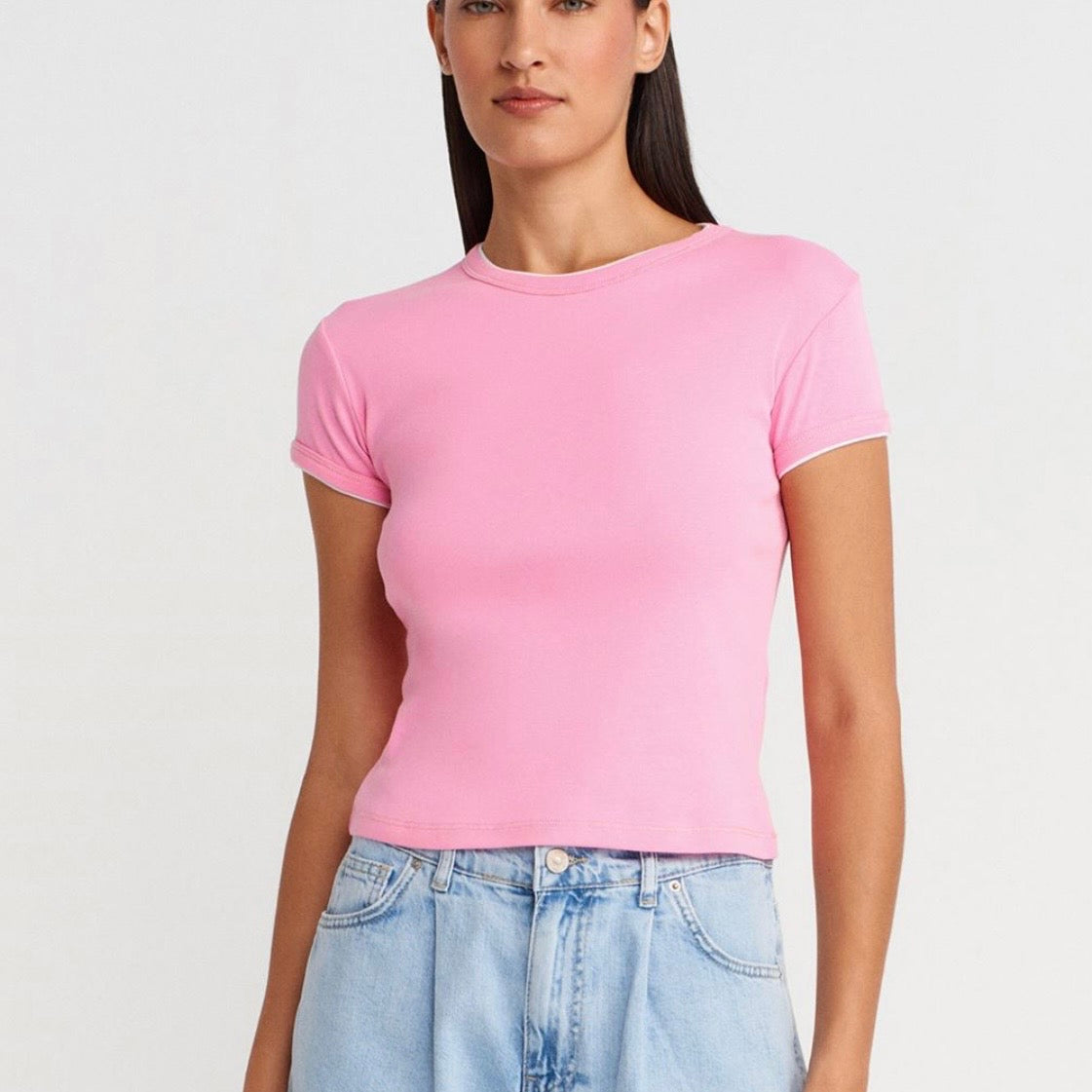 Pink fitted t-shirt with white trim
